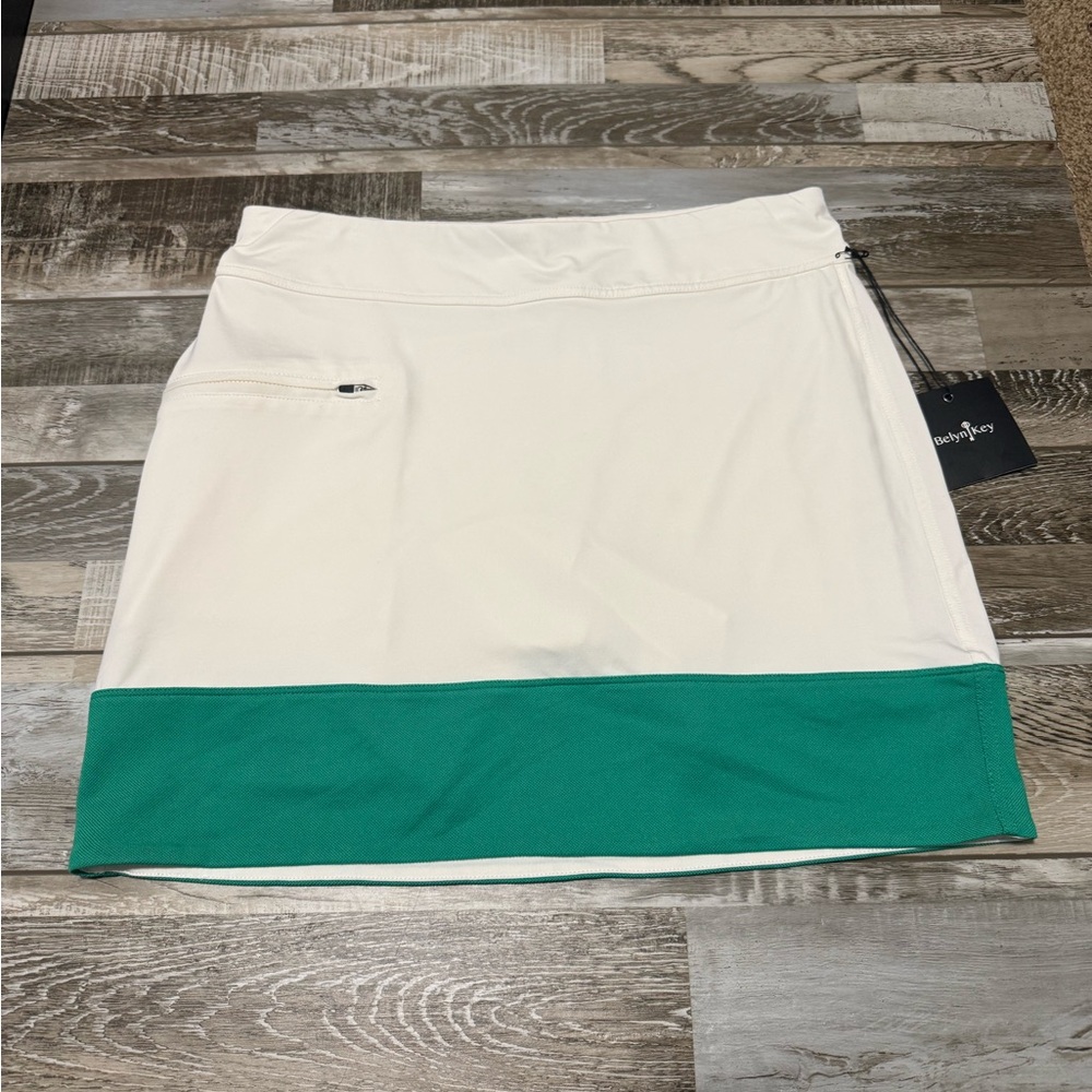 Belyn Key Cream Mini Skirt with Green Hem